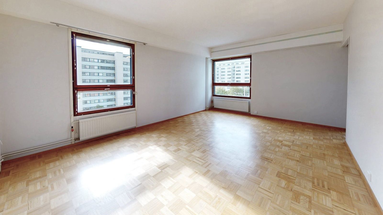 The living room as photographed, empty and unfurnished